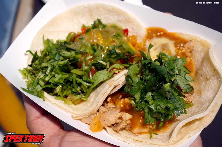 Pork and chicken tacos with a generous helping of cilantro