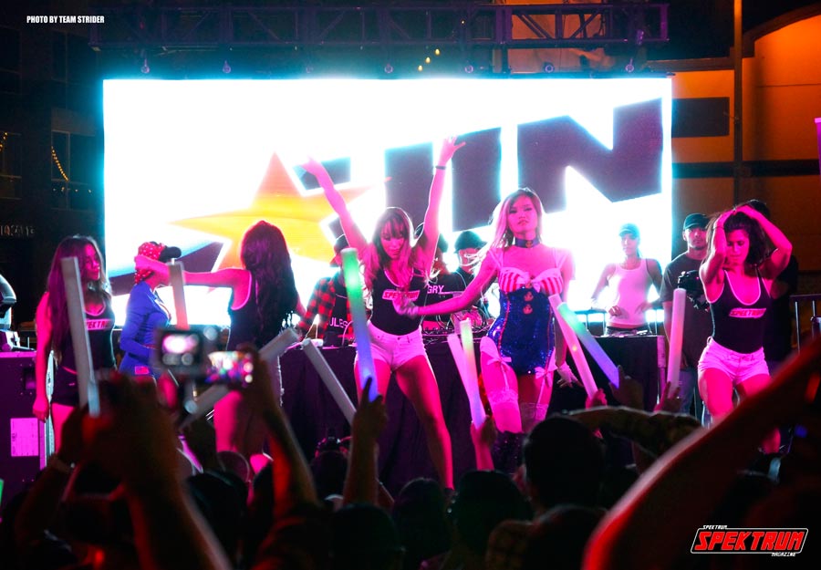 Our lovely Spektrum team members on stage with the HIN Go-Go Dancers!