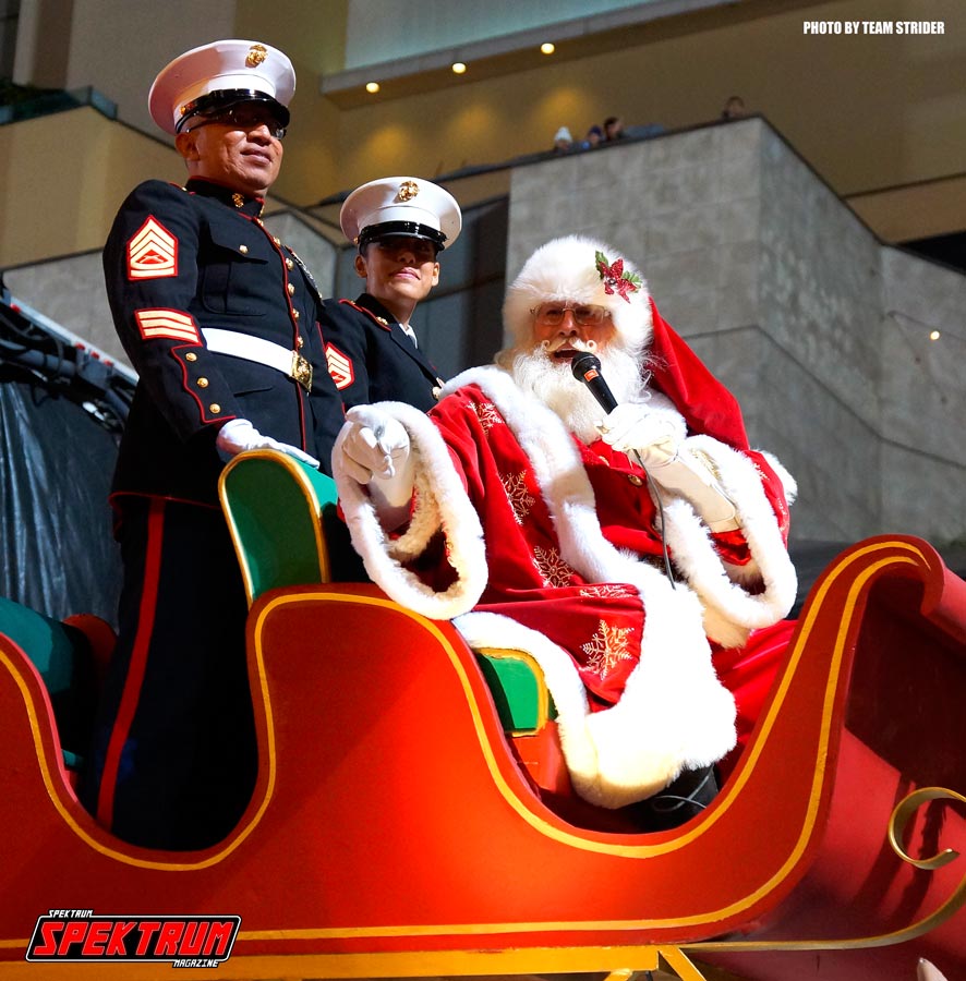 Santa Claus working the crowd at the Hollywood Christmas Parade